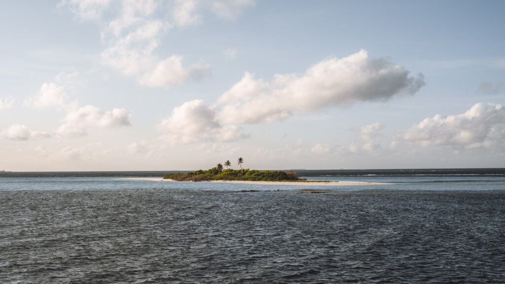 maldivian islet amidst blue sea